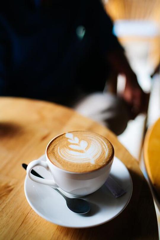 kopje koffie met latte art
